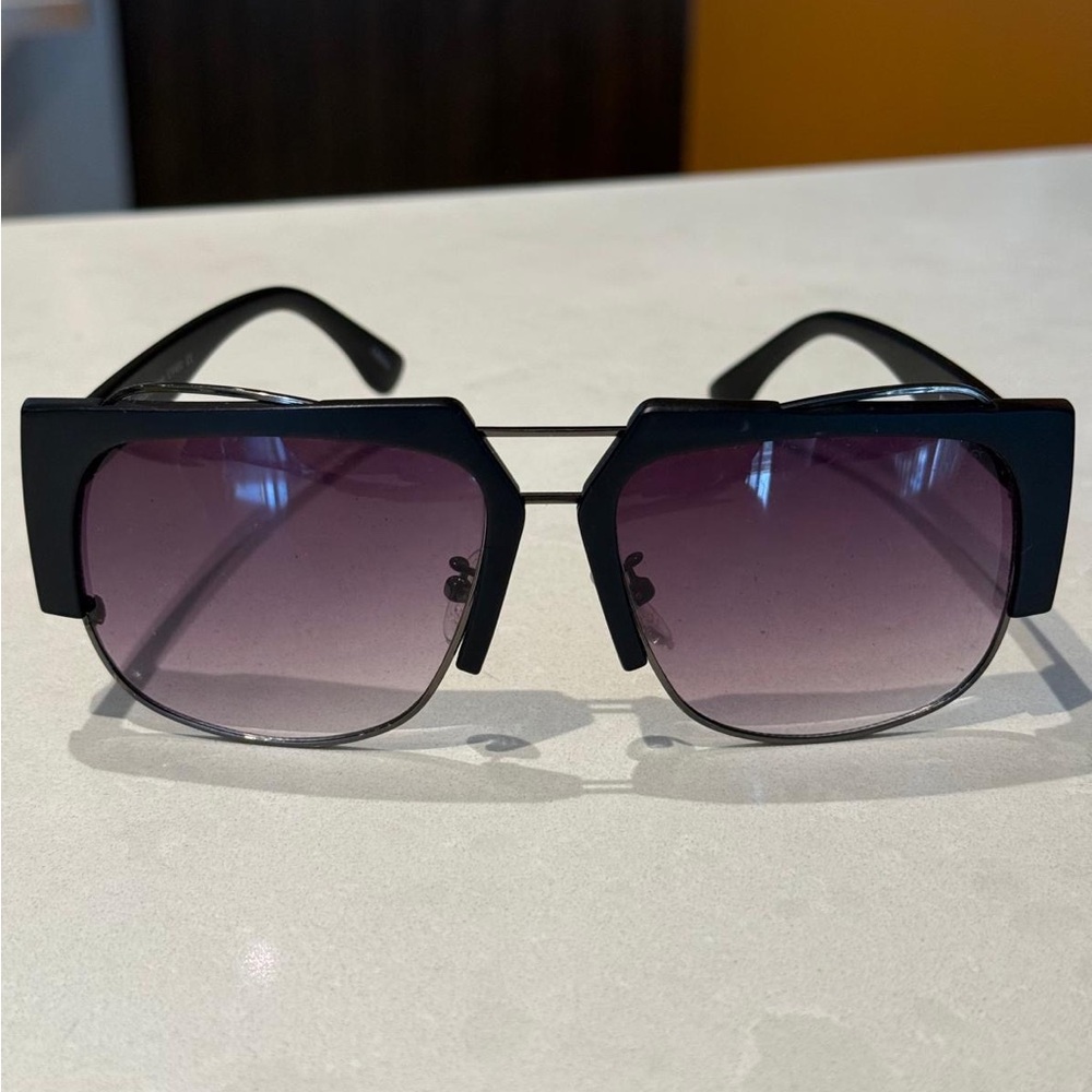 Stylish Black Sunglasses with Purple Lenses